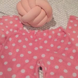 Pink pajama pants with white polka dots